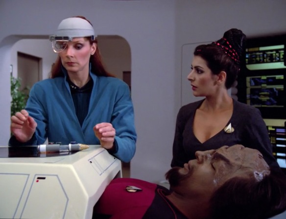 TROI: And here I was thinking my wigs were the low point of our wardrobe.